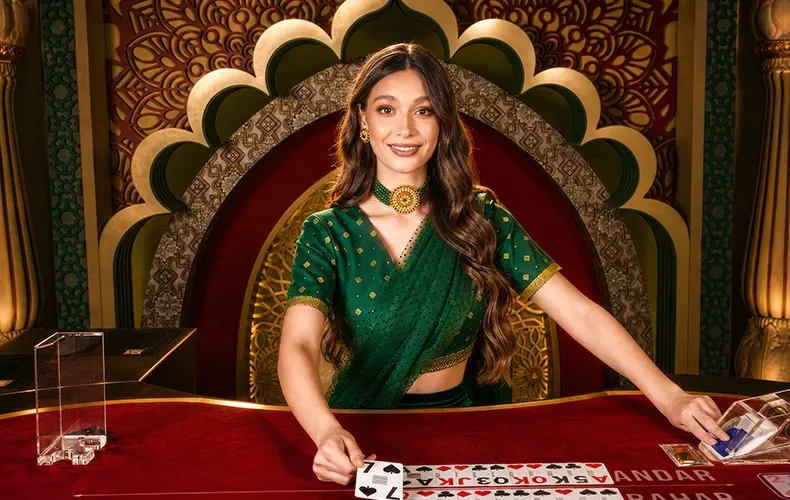 Live Andar Bahar card game studio featuring middle Joker card and side bets